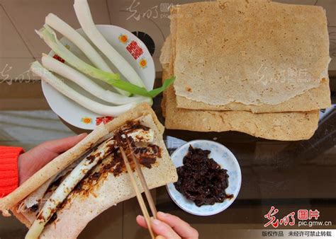 潍坊煎饼卷大葱酒店订餐电话,你喜欢吃煎饼卷什么呢